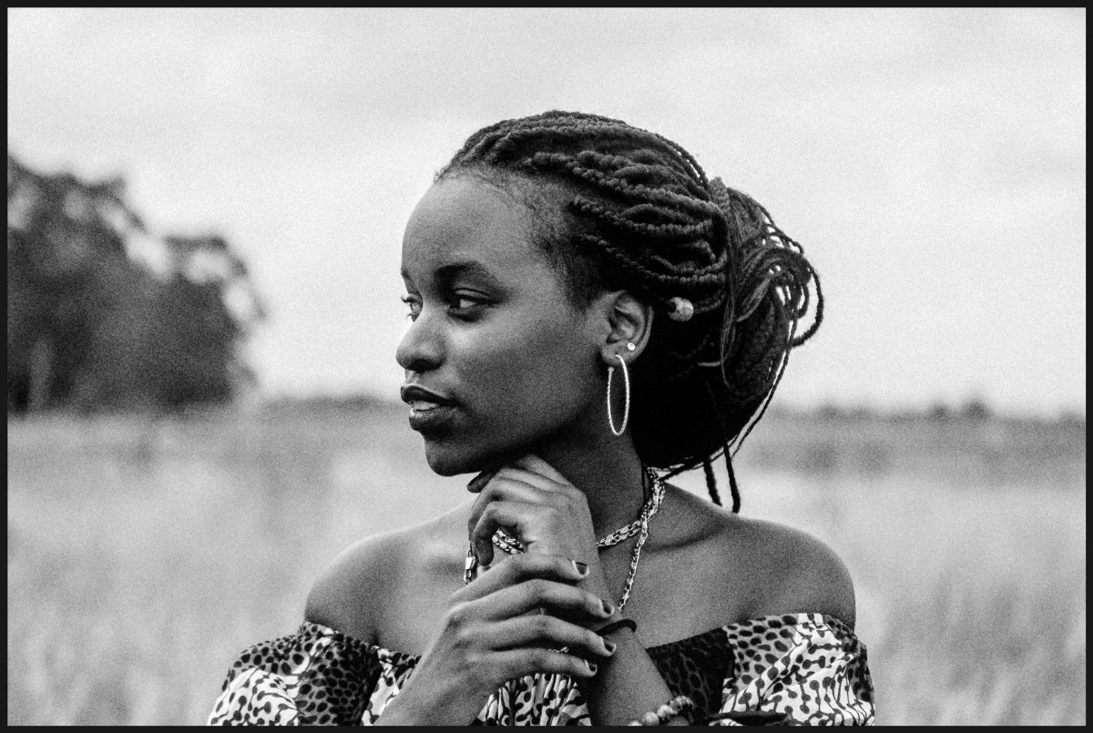 Black and white portrait of a woman, with grain applied